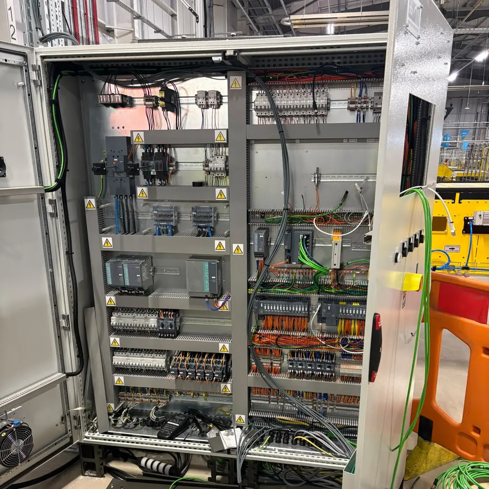 Open industrial control panel showing its wiring
